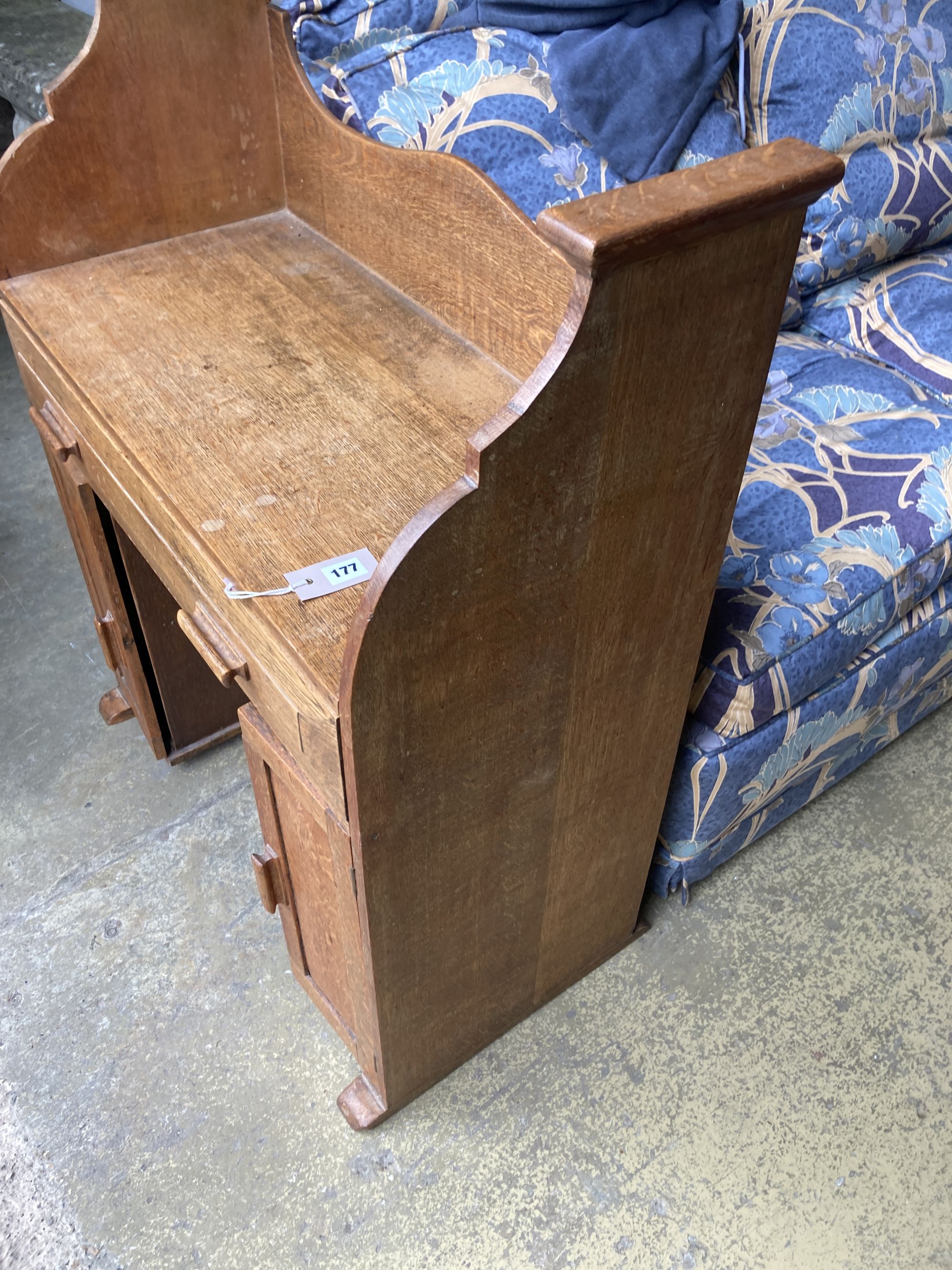 An Art Deco oak desk, width 79cm, depth 40cm, height 97cm